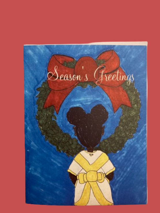 Christmas card with a wreath, red bow, and silhouette of a person in a yellow dress on a blue background.